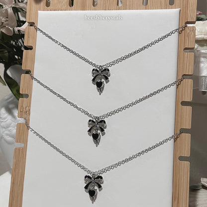 Bow charm necklace